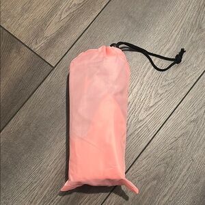 Inflatable foot bath. Pink in drawstring bag